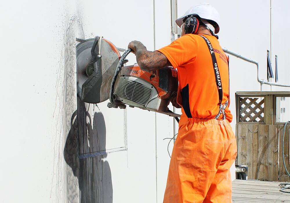 cutting a window in a concrete wall